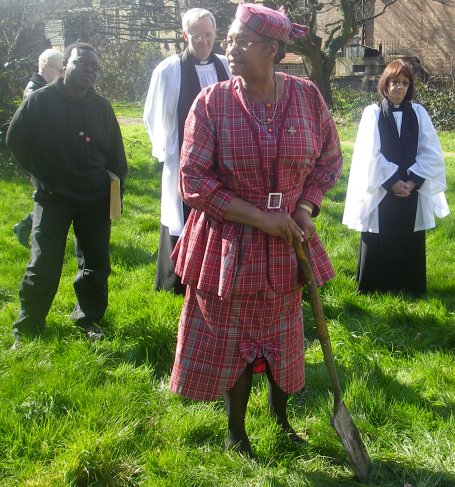 Mrs Edwards plants a commemorative tree