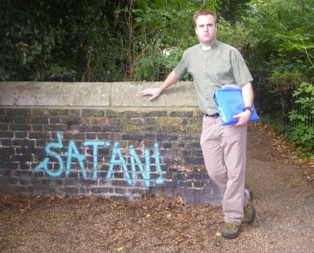 Rev Tim Davies shows me church wall graffitti Rev Tim Davies shows me church wall graffitti
